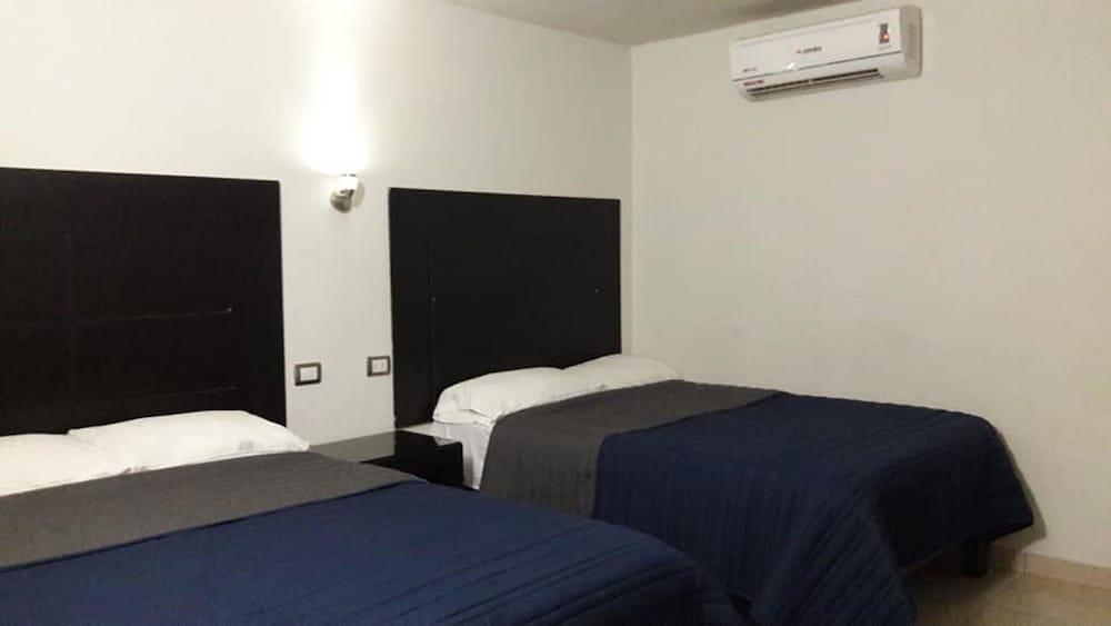 Hotel Flores Guamuchil Kültér fotó